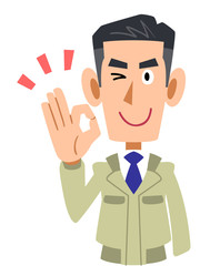 OKのサインを出す作業着を着た男性の上半身