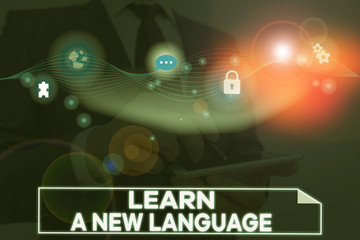Conceptual hand writing showing Learn A New Language. Concept meaning Study Words other than the...
