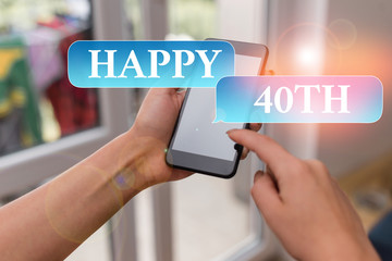 Text sign showing Happy 40Th. Business photo text a joyful occasion for special event to mark the 40th year woman using smartphone office supplies technological devices inside home