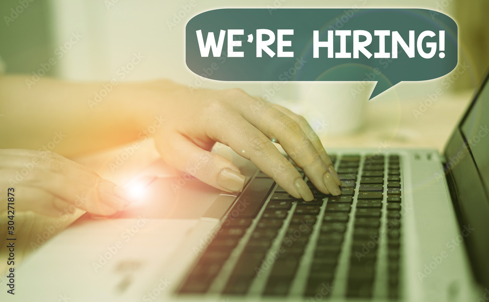 Poster text sign showing we are re hiring. business photo showcasing process of reviewing applications and 