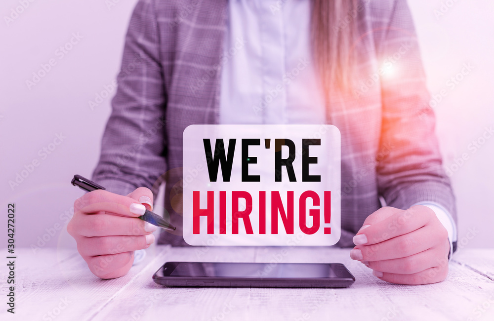 Poster text sign showing we are re hiring. business photo text process of reviewing applications and findin