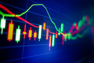 Blue stock exchange market graph on LED screen for business analysis. Finance and economic graphs.