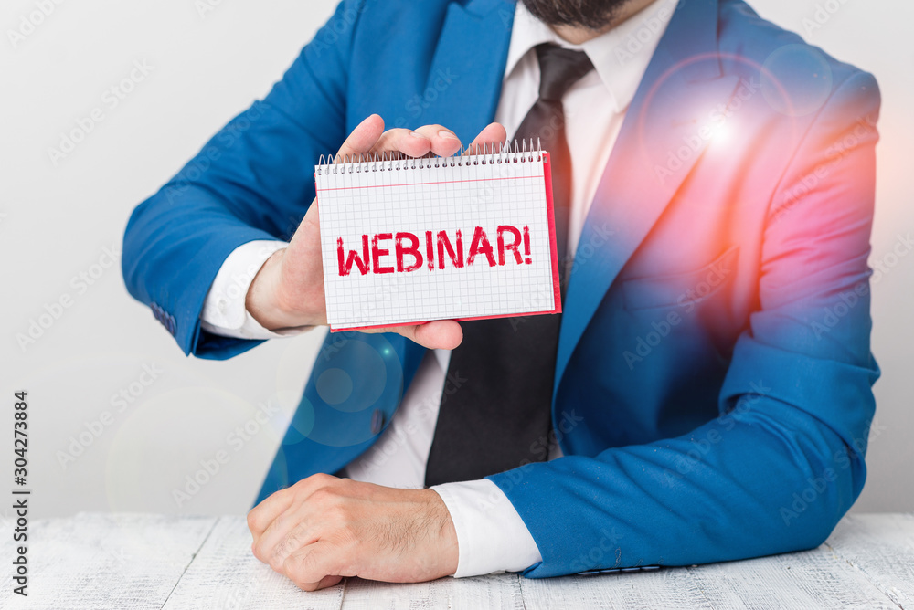 Aufkleber Text sign showing Webinar. Business photo showcasing a seminar or other presentation that takes place on the Internet Man holds empty paper with copy space in front of him Copy Space