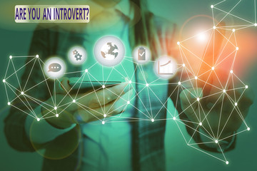 Text sign showing Are You An Introvertquestion. Business photo text demonstrating who tends to turn...