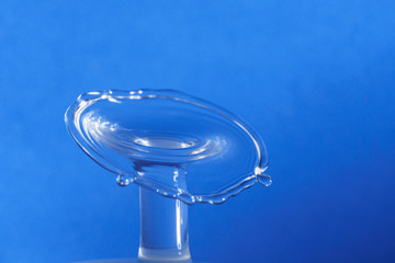 Water drop collision form with blue background