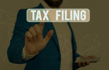 Word writing text Tax Filing. Business photo showcasing Submitting documens filed with tax payer...