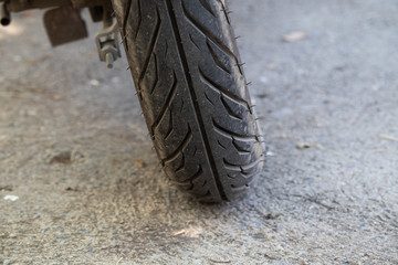 Fototapeta na wymiar motorcycle tire on the road