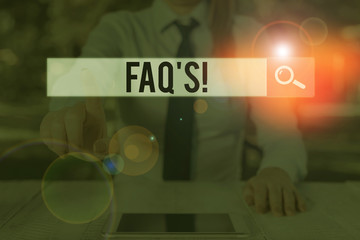 Writing note showing Faq. Business concept for a list of questions and answers relating to a...