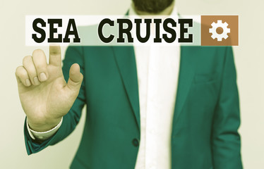 Handwriting text Sea Cruise. Conceptual photo a voyage on a ship or boat taken for pleasure or as a vacation Businessman in blue suite and white shirt pointing with finger in empty space