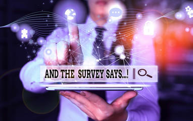 Conceptual hand writing showing And The Survey Says. Concept meaning written spoken results of...