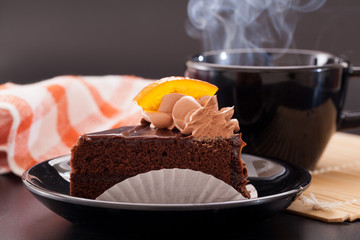 Delicious fresh chocolate cake with tea