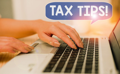 Text sign showing Tax Tips. Business photo showcasing compulsory contribution to state revenue levied by government