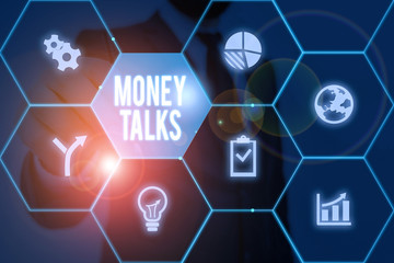 Writing note showing Money Talks. Business concept for the wealth gives power and influence to those who possess it