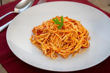 Spaghetti with tomato sauce and basil