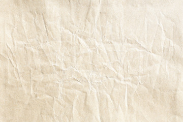 Fototapeta na wymiar crumpled old brown kraft background paper texture