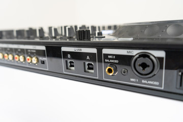 Obraz premium Cable to connect professional DJ midi controller to audio mixer.Concert equipment for home party.Disc jockey technology to mix digital music tracks.RCA audio cables