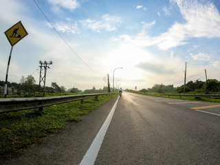 Fototapeta na wymiar Empty road sunrise