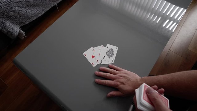 Deck of cards four aces high dealer winning hand