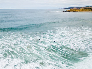 A group of surfer with waves