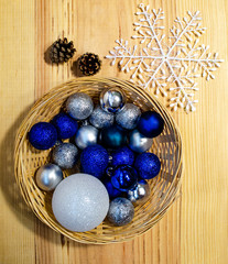 Christmas composition: a basket with Christmas toys