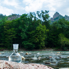 Glass flask with clean drinking water.