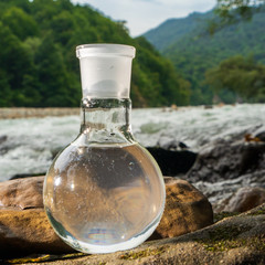Glass flask with clean drinking water.