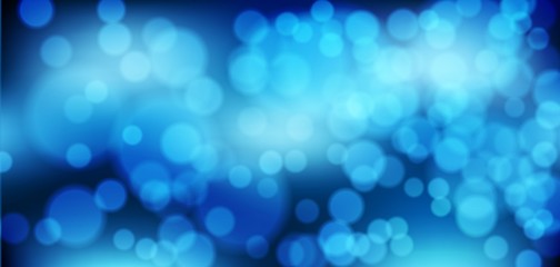 Blue bokeh background. Christmas glowing lights with sparkles. Holiday decorative effect.