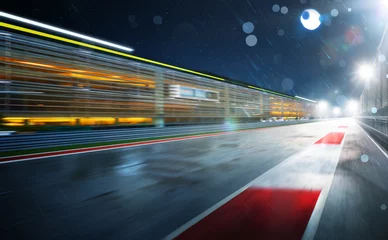 Zelfklevend Fotobehang Uitzicht op de oneindig lege asfalt internationale racebaan © jamesteohart