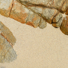Fototapeta na wymiar Sand beach rocks texture