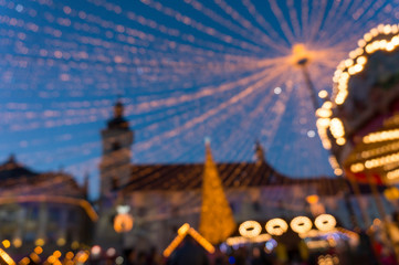 Holidays, sale and retail concept, evening christmas market at old town of Sibiu, Transylvania