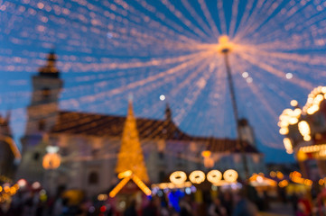 Holidays, sale and retail concept, evening christmas market at old town of Sibiu, Transylvania