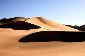 Fototapeta na wymiar Black holes in the sand dunes 
