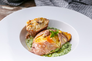 Close-up grilled squid stuffed with vegetables and cheddar cheese. Recipes of Mediterranean cuisine. Ketogenic diet