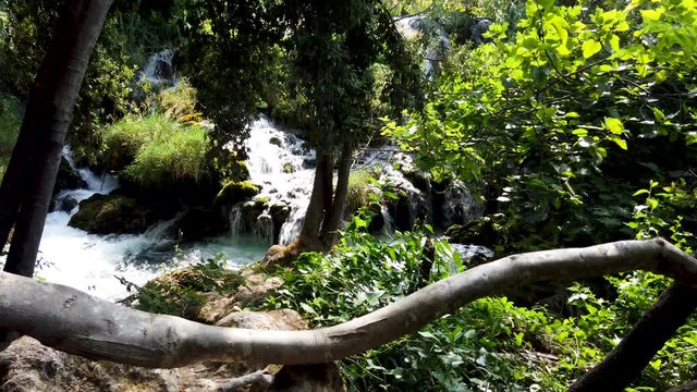 Little waterfall, frash cold water falling down