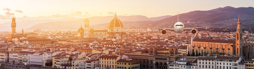 Fototapeta premium Front of real plane aircraft, on Florence Cityscape in Sunrise at Florence, Italy background