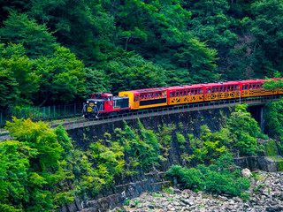 Katsura River and Sagano sightseeing railway trolley train. Arashiyama, Nishikyo-ku, Kyoto-shi, Kyoto