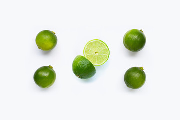 Fresh limes on white background.