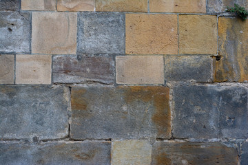 Background of old stone blocks of different colors