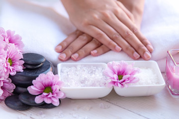 Obraz na płótnie Canvas Spa treatment and product for female feet and manicure nails spa with pink rose flower, copy space, soft and select focus, Thailand. Healthy Concept.