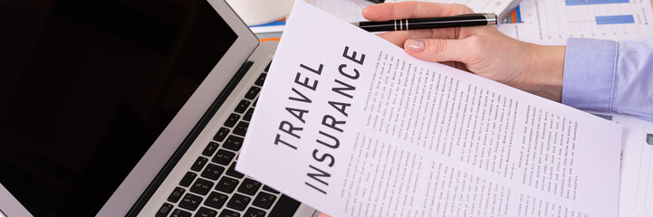 Fototapeta premium travel insurance concept, documents on the desktop