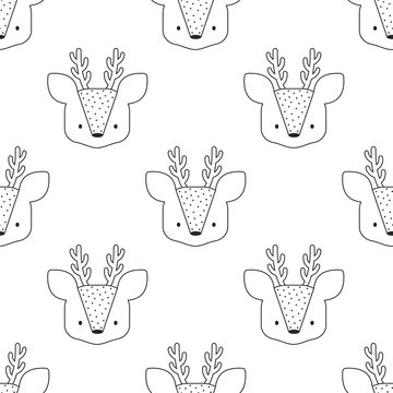 Vector seamless pattern with cute deer heads; white background; cute cartoon design for wallpaper, wrapping paper, fabric, greeting card, web design. © Xaphana