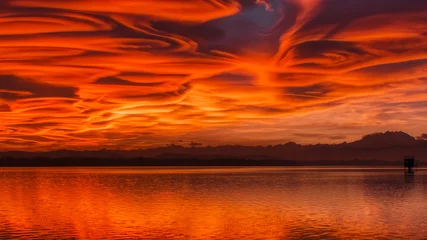 Fototapete Rot sunset over the lake of Varese  © Massimo De Candido