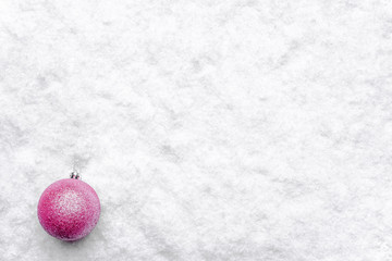 Christmas ornament in snow on christmas white background