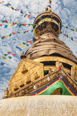 Pinnacle with flags of the Swayambhunath stupa or Monkey Temple in Kathmandu, Nepal