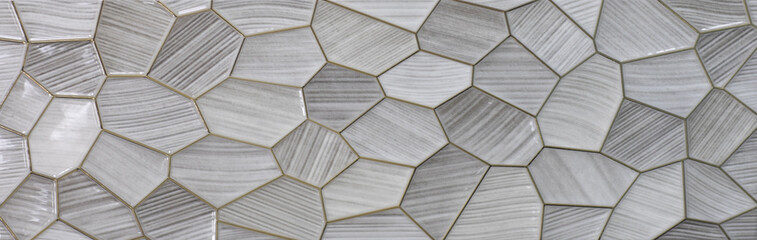 Panele Szklane  szara ceramiczna płytka kuchenna z abstrakcyjnym geometrycznym wzorem mozaiki
