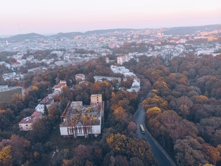 aerial view of autumn city park on sunset
