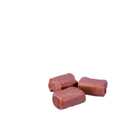 candies or caramel candies on a white background.