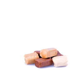candies or caramel candies on a white background.
