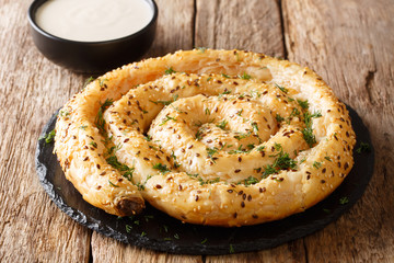 Snail pie borek (burek) from filo pastry with feta cheese closeup. horizontal