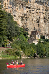  Canoeing on Dordogne river in La Roque-Gageac, Aquitaine, France